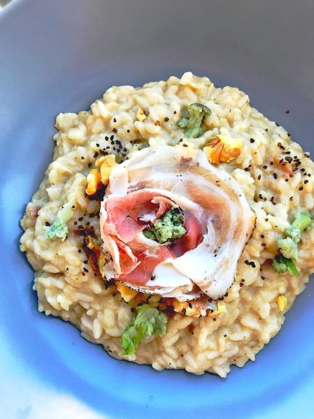 Risotto con crema di Cavolfiore, Guanciale al pepe Nero, Pecorino e Noci